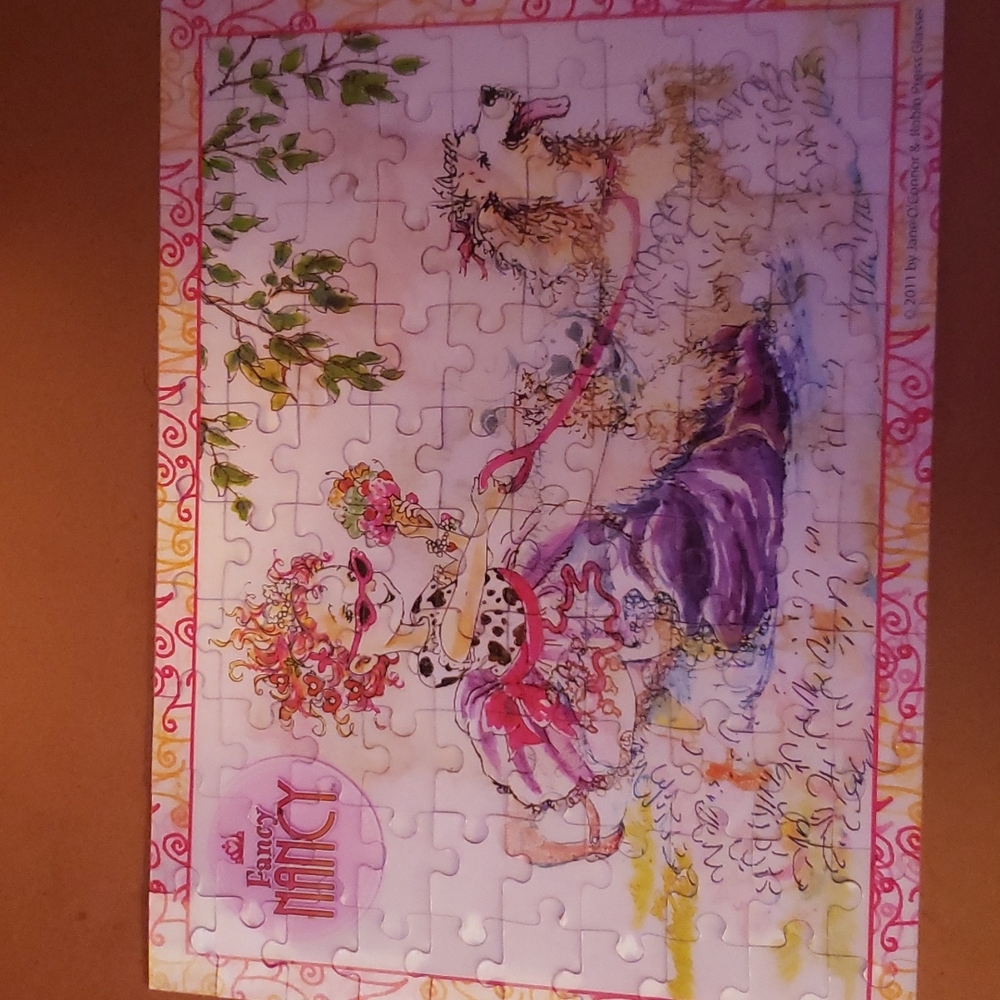 Fancy  Nancy.   100 pc Lenticular puzzle